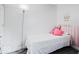 The bedroom features a single bed, a unicorn decal on the wall, and light-colored flooring at 1715 Haynes Ave, Indianapolis, IN 46240