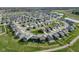 Wide aerial perspective of this home within the community that includes nearby ponds and playgrounds at 17344 Hanningfield Way, Westfield, IN 46074