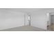 Bedroom featuring carpet floors, white walls, an open door to a bathroom at 17344 Hanningfield Way, Westfield, IN 46074