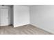 Bright bedroom with neutral carpet, white walls, and a modern door at 17344 Hanningfield Way, Westfield, IN 46074