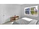 Bright bedroom filled with sunlight features a charming accent table at 17344 Hanningfield Way, Westfield, IN 46074
