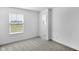 Bedroom showcasing carpet, a window with blinds, and a door frame at 17344 Hanningfield Way, Westfield, IN 46078