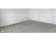 Bedroom featuring carpet floors, white walls, and a closed door at 17344 Hanningfield Way, Westfield, IN 46074