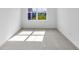 Bright bedroom with carpet and a window view of the neighborhood at 17344 Hanningfield Way, Westfield, IN 46074