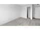 Bedroom showcasing neutral carpet and doors leading to closet space at 17344 Hanningfield Way, Westfield, IN 46074