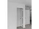 Interior view of the home showcasing carpet and the doorframe in the hallway at 17344 Hanningfield Way, Westfield, IN 46074