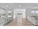 Open-concept kitchen and living room featuring lots of natural light and ample space at 17344 Hanningfield Way, Westfield, IN 46074