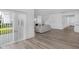 Open-concept living space with sliding glass doors, modern finishes, and seamless transitions at 17344 Hanningfield Way, Westfield, IN 46074