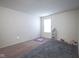 Bright bedroom featuring neutral carpet, textured ceiling, and a sunny window at 1739 Elderberry Dr, Indianapolis, IN 46234