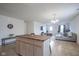 Open concept kitchen and living room featuring hardwood island and stainless sink at 1739 Elderberry Dr, Indianapolis, IN 46234