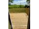 New back deck with railing overlooking greenery at 1945 Plantation Ln, Martinsville, IN 46151