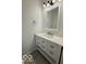 Bathroom featuring an elegant vanity with sink, and bronze fixtures at 1945 Plantation Ln, Martinsville, IN 46151
