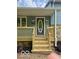 Inviting front porch featuring a well-maintained porch with new stairs and stone accents at 1945 Plantation Ln, Martinsville, IN 46151