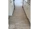 Kitchen view featuring tile floors, granite counters, and white cabinets at 1945 Plantation Ln, Martinsville, IN 46151