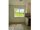 Kitchen corner with granite counters, white cabinets, and view at 1945 Plantation Ln, Martinsville, IN 46151