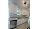 Kitchen featuring granite counters, white cabinets, and stainless steel appliances at 1945 Plantation Ln, Martinsville, IN 46151