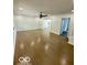 Bright living room featuring beautiful hardwood floors at 1945 Plantation Ln, Martinsville, IN 46151