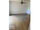 Living room with hardwood floors and neutral walls at 1945 Plantation Ln, Martinsville, IN 46151