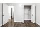 Hallway featuring a view of a walk-in closet with ample shelving at 2237 N New Jersey St, Indianapolis, IN 46205
