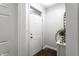 Bright entryway with white walls, white doors, and wood flooring perfect for welcoming guests to the home at 2237 N New Jersey St, Indianapolis, IN 46205