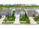 Beautiful aerial view of a home next to a serene pond in a quiet neighborhood at 2396 Creek Bank Dr, Columbus, IN 47201