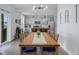 Dining area between kitchen and living room with stylish lighting at 2396 Creek Bank Dr, Columbus, IN 47201