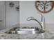 Close up of kitchen sink with granite countertop at 2396 Creek Bank Dr, Columbus, IN 47201