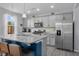 Bright kitchen with stainless appliances, granite counters, island with seating at 2396 Creek Bank Dr, Columbus, IN 47201