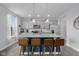 Stylish kitchen with a large island, modern appliances, and wooden bar stools at 2396 Creek Bank Dr, Columbus, IN 47201