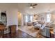 Cozy living room featuring a comfortable sectional sofa, an area rug, and lots of light with views to the outside at 2449 Orchard Creek Dr, Columbus, IN 47201