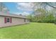 Expansive backyard with lush green grass, providing ample space for recreation and outdoor activities at 2539 S Lyons Ave, Indianapolis, IN 46241