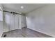 Bedroom featuring a barn door to a closet with new vinyl flooring throughout at 2706 Shakespeare Dr, Indianapolis, IN 46227