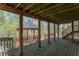 Exterior deck featuring an outdoor gazebo overlooking surrounding trees and an outdoor staircase at 2985 Little Hurricane Rd, Martinsville, IN 46151