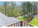 Scenic rooftop deck with views of a canopy of springtime trees, blue sky and a walking path at 2985 Little Hurricane Rd, Martinsville, IN 46151
