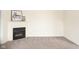 Living room detail showcases a modern electric fireplace with a decorative mantle, creating a cozy space at 3006 Wildcat Ln, Indianapolis, IN 46203