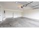 Spacious garage with concrete floor and overhead door at 3006 Wildcat Ln, Indianapolis, IN 46203