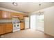 Well-organized kitchen with a full set of appliances, ample storage, and access to outdoor deck space at 3006 Wildcat Ln, Indianapolis, IN 46203