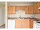 Bright kitchen featuring a sink with ample cabinets and countertop space, creating an efficient work space at 3006 Wildcat Ln, Indianapolis, IN 46203