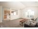 Open concept living room with views into the kitchen and dining, perfect for entertaining guests at 3006 Wildcat Ln, Indianapolis, IN 46203
