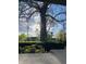 The view shows a tree in front of a yard and a house in the background at 301 N Main St, Franklin, IN 46131