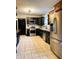 Well-equipped kitchen with stainless steel appliances and ample counter space at 301 N Main St, Franklin, IN 46131