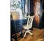 Home office features a vintage desk and hardwood floors at 301 N Main St, Franklin, IN 46131