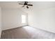 Spacious bedroom featuring neutral carpet, a ceiling fan, and a window with plenty of natural light at , Indianapolis, IN 46203