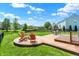 Backyard with patio, fire pit, ample seating, and a well-maintained lawn perfect for outdoor relaxation at 3101 Woodhaven Way, Bargersville, IN 46106