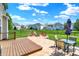 An outdoor backyard with a beautiful stamped concrete patio, built in fire pit and lots of seating at 3101 Woodhaven Way, Bargersville, IN 46106
