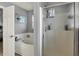This bathroom features a tub, shower, and decorative artwork at 3101 Woodhaven Way, Bargersville, IN 46106