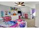 Cheerful bedroom space with fun decor and plenty of room to play at 3101 Woodhaven Way, Bargersville, IN 46106