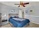 Cozy bedroom with ceiling fan, carpet and natural light at 3101 Woodhaven Way, Bargersville, IN 46106