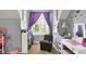 Bright bedroom area with chair, desk and window with natural light at 3101 Woodhaven Way, Bargersville, IN 46106