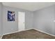Neutral bedroom featuring gray walls, brown carpet, and natural light, ideal for relaxation and personalization at 3101 Woodhaven Way, Bargersville, IN 46106